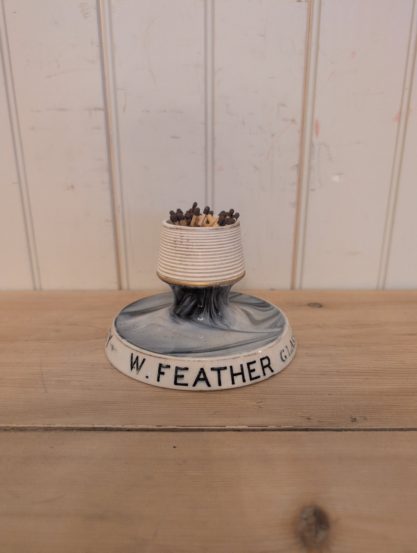 Match Strike "W. Feather"